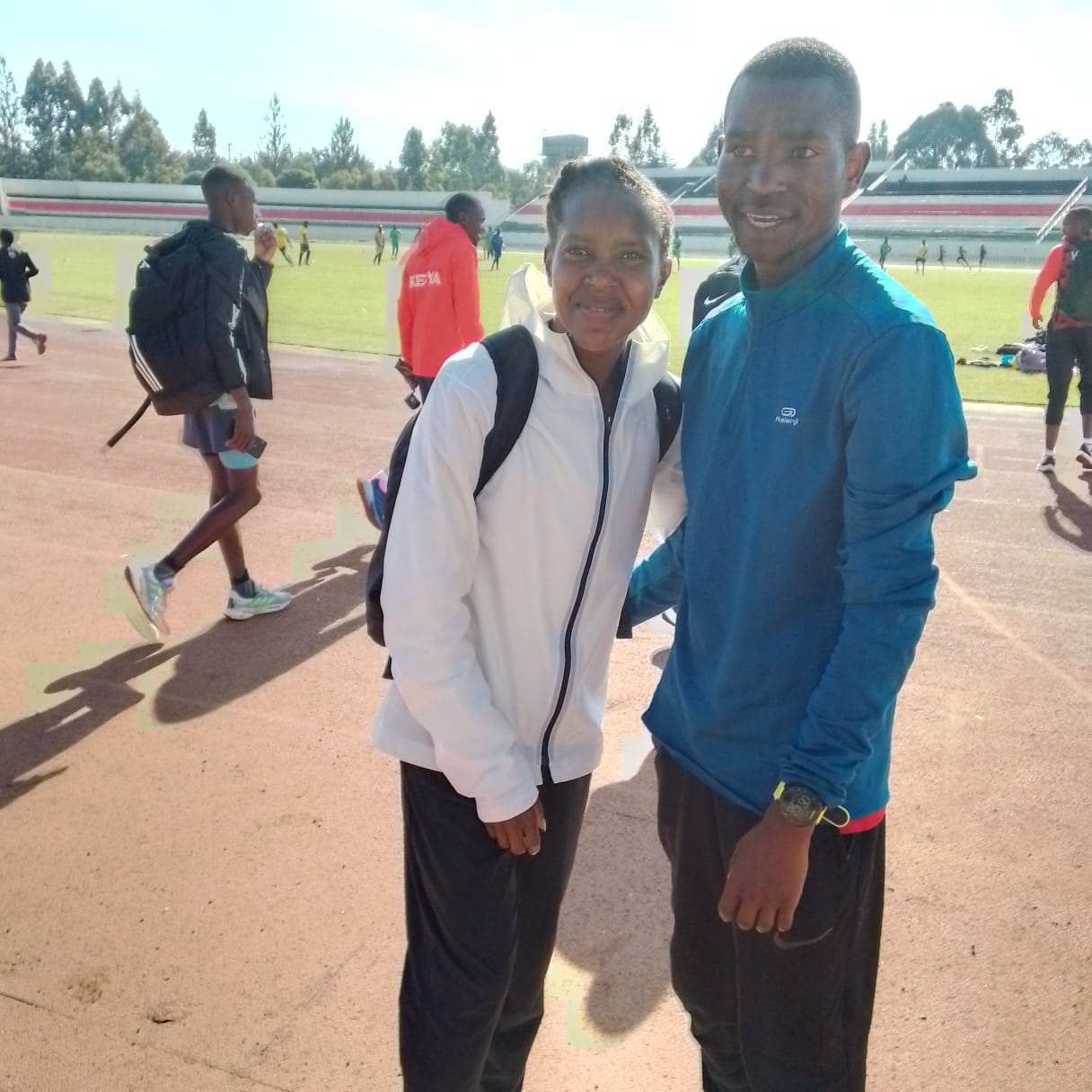 Erick com Faith Kipyegon
